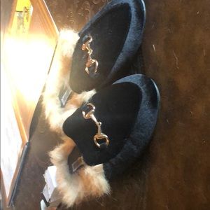 Black shoes with horse shoe buckle